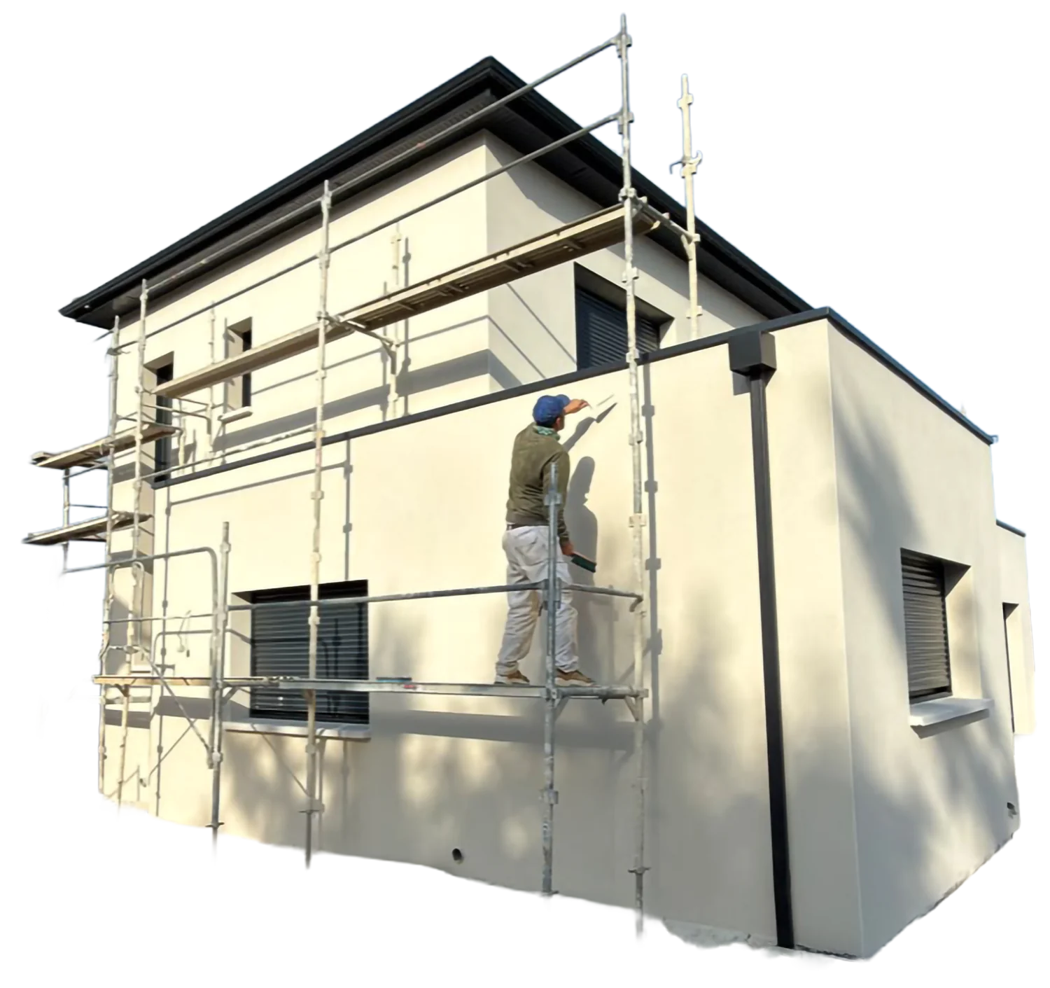 Façadier sur un échafaudage enduisant la façade d’une maison moderne